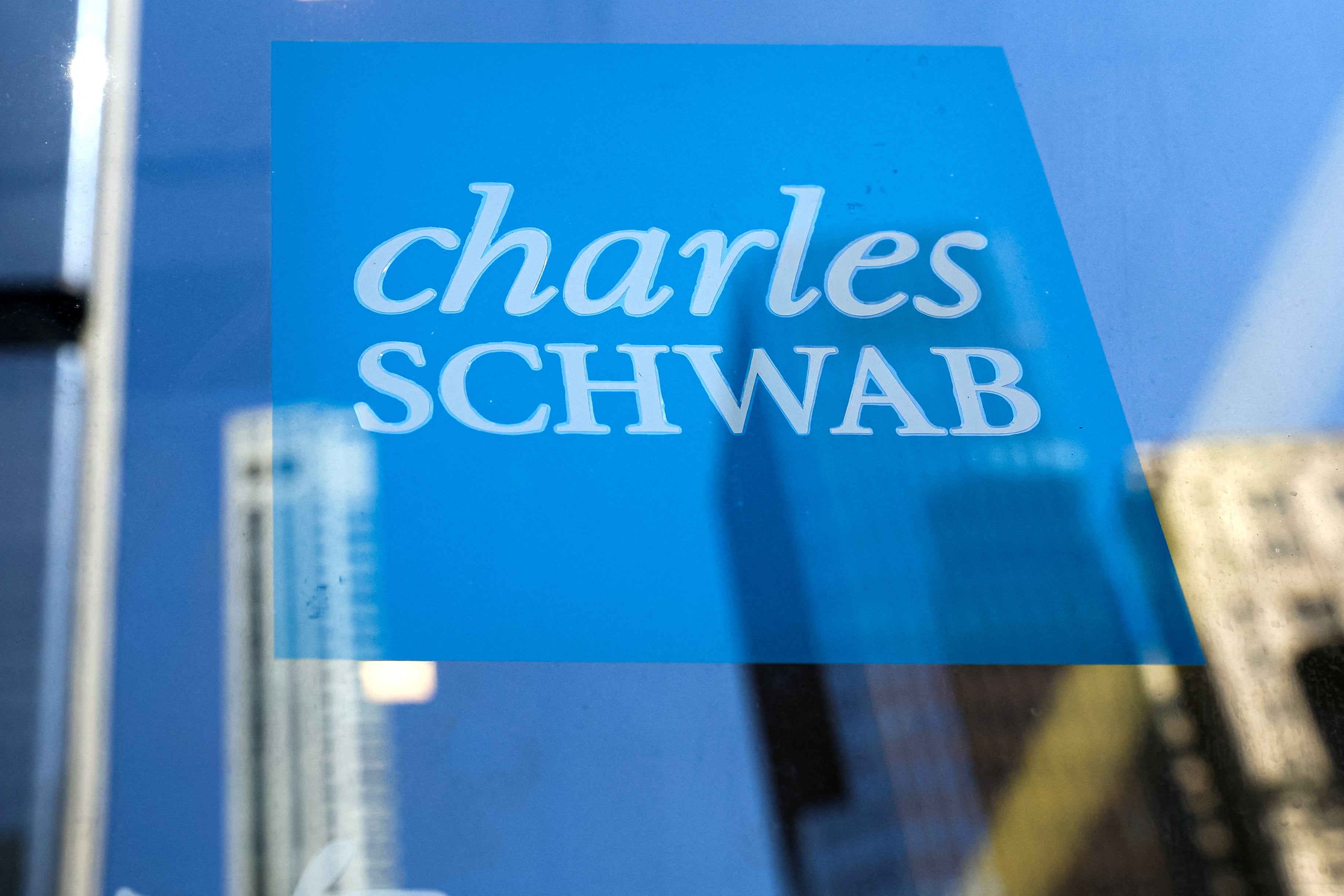 Charles Schwab slashing jobs, offices to streamline operations