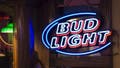 Signage of Bud Light outside a bar in New York City.