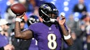 Lamar Jackson #8 of the Baltimore Ravens warms up before the game against the Denver Broncos at M&amp;amp;T Bank Stadium on December 04, 2022 in Baltimore, Maryland. 