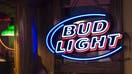 Signage of Bud light outside a bar in New York City.