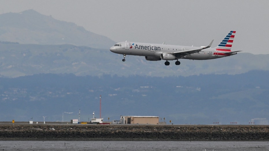 An American Airlines plane lands at San Francisco International Airport