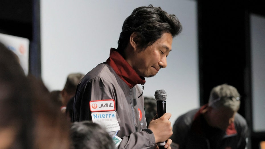CEO Takeshi Hakamada bows