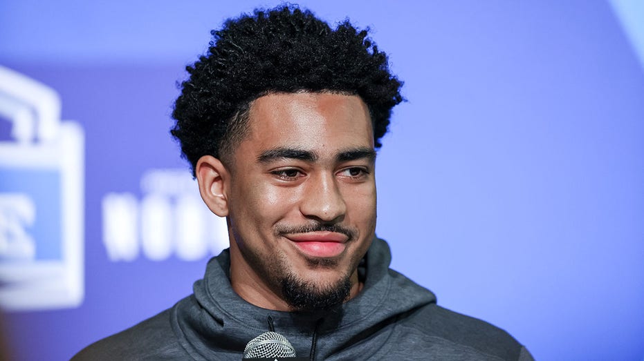 Quarterback Bryce Young of Alabama speaks to the media