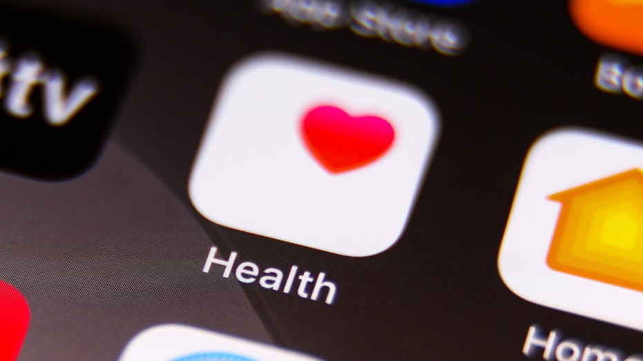 The Apple Health icon is seen displayed on a phone screen