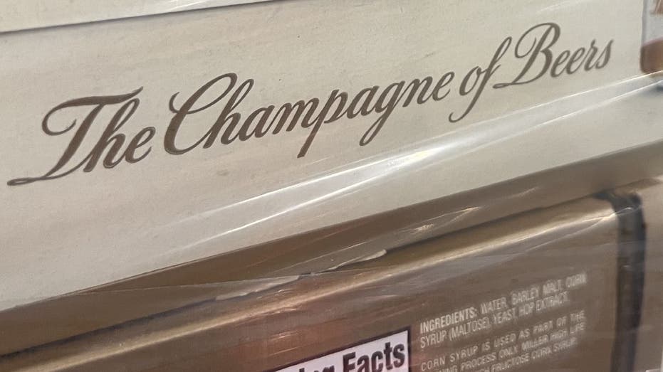 Close-up view of Miller High Life's 'The Champagne of Beers' slogan