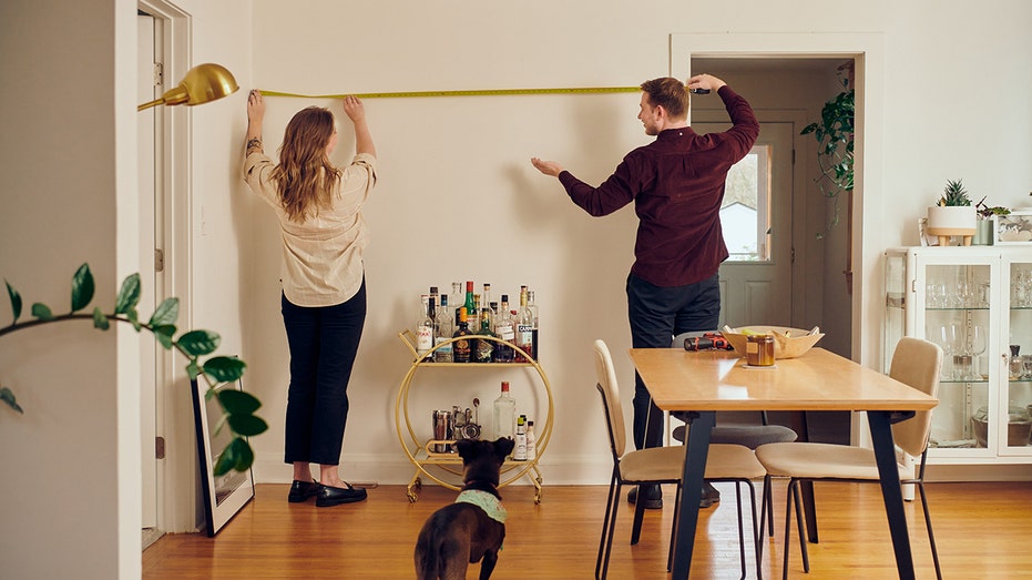 Millennial couple decorates apartment