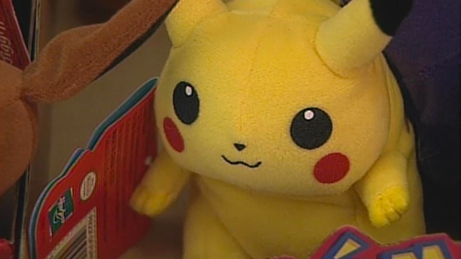 Pikachu stuffed toy on store shelf in the 90s