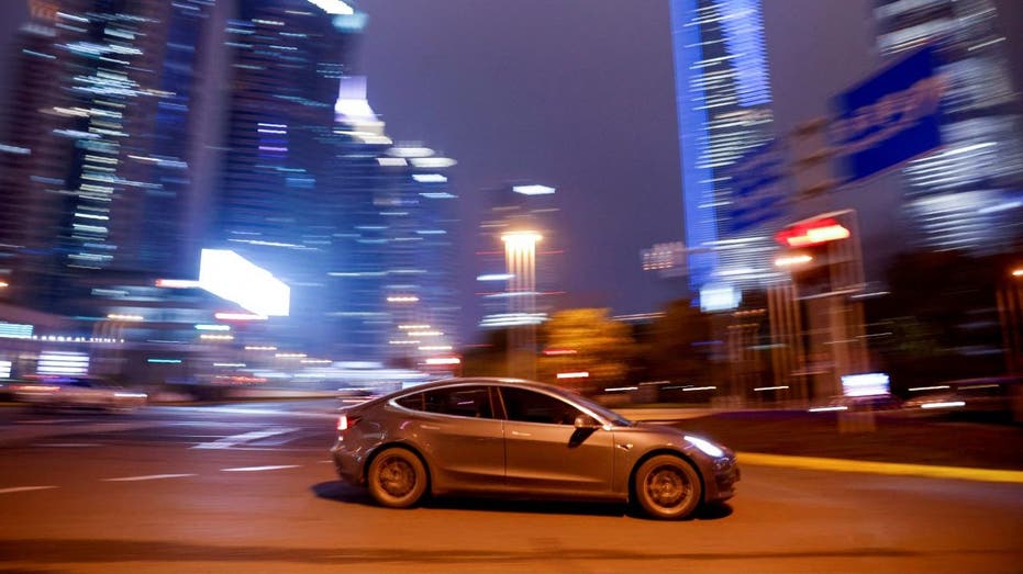 Tesla EV on a city street