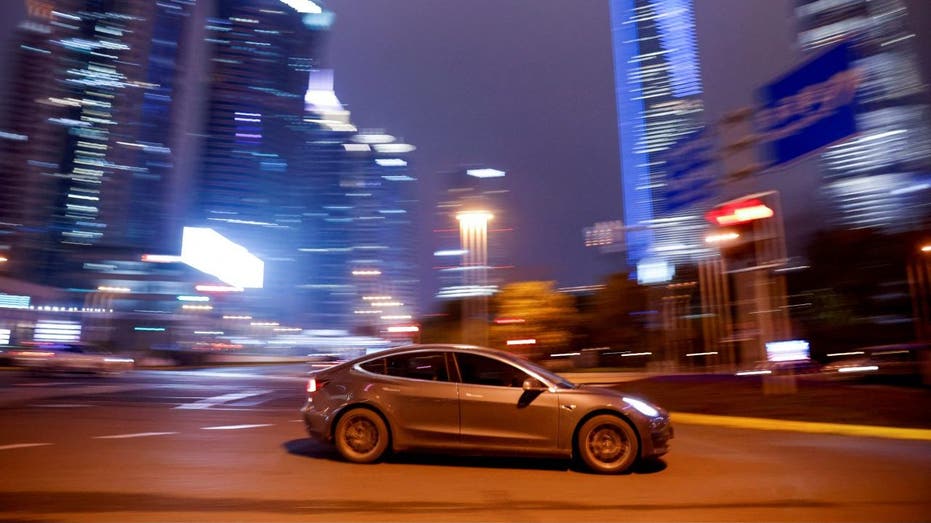 Tesla EV on a city street