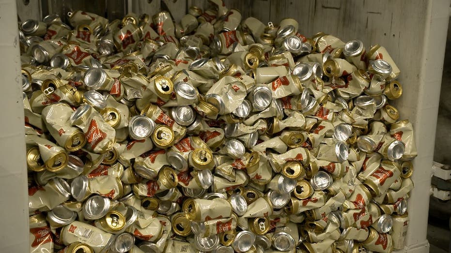 Thousands of crushed Miller High Life cans