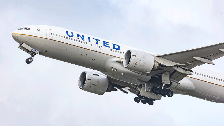 United airlines plane in the sky