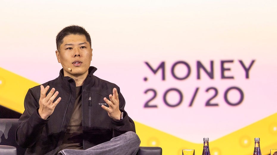 Wayne Chang speaking at an event 