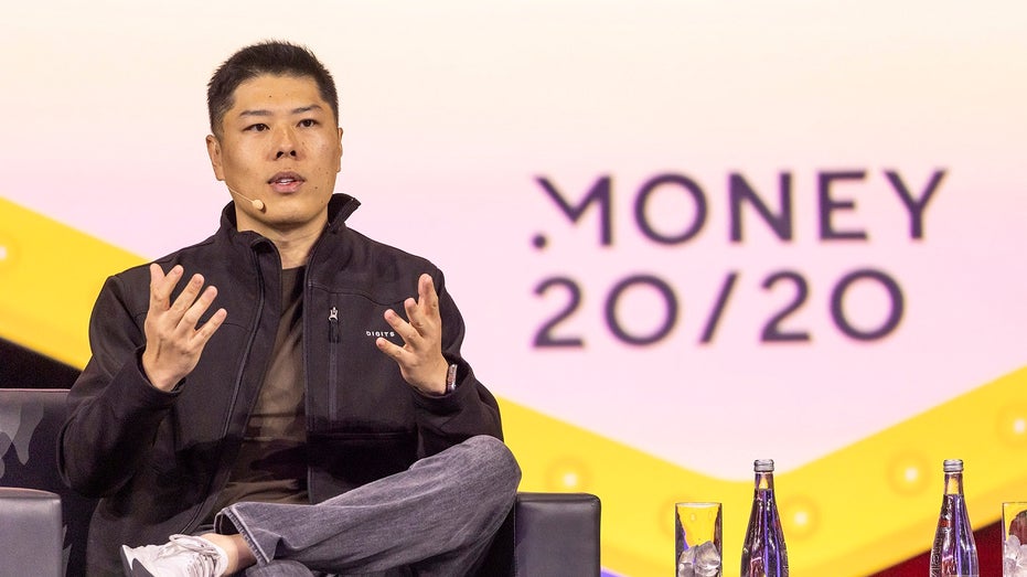 Wayne Chang speaking at an event 