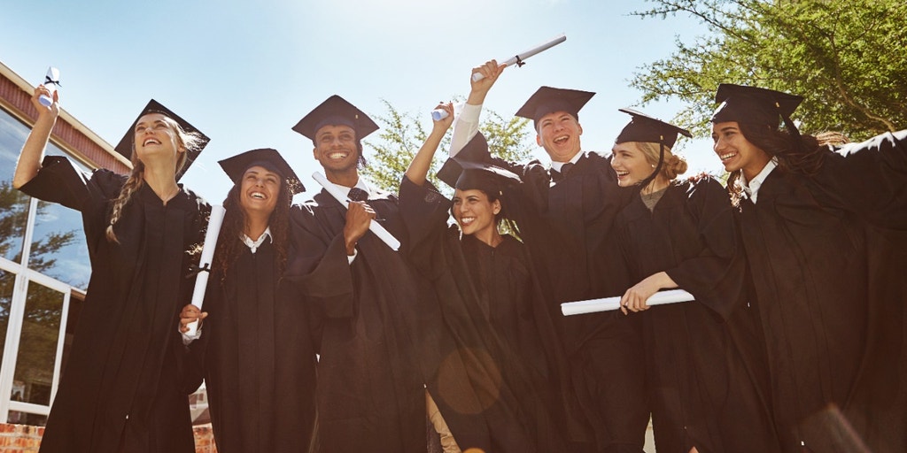 https://a57.foxnews.com/static.foxbusiness.com/foxbusiness.com/content/uploads/2023/05/1024/512/College-graduates-smiling.jpg?ve=1&tl=1