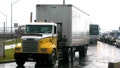 UNITED STATES - JUNE 07: A truck carrying a load of cargo from Mexico pulls into the border checkpoint at Brownsville, Texas, after crossing over the Veterans Bridge, visible at left, on Monday, June 7, 2004. 