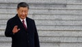 China's President Xi Jinping waves as he arrives for the official welcoming ceremony for his French counterpart Emmanuel Macron in Beijing on April 6, 2023. 