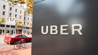 Uber shares sink despite first profitable quarter