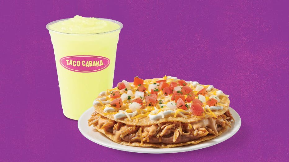 Taco Cabana's Double Crunch Pizza served with a margarita.