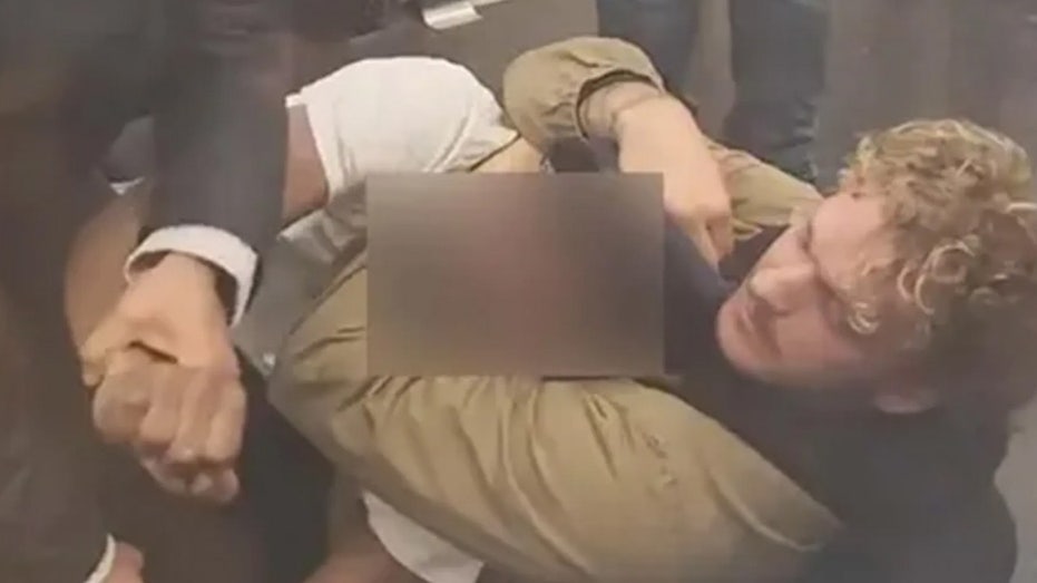 Daniel Penny shown holding Jordan Neely in a chokehold.