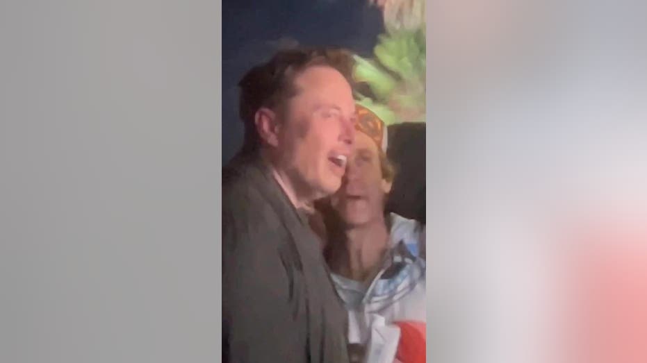 Elon Musk looks amazes with his mouth agape