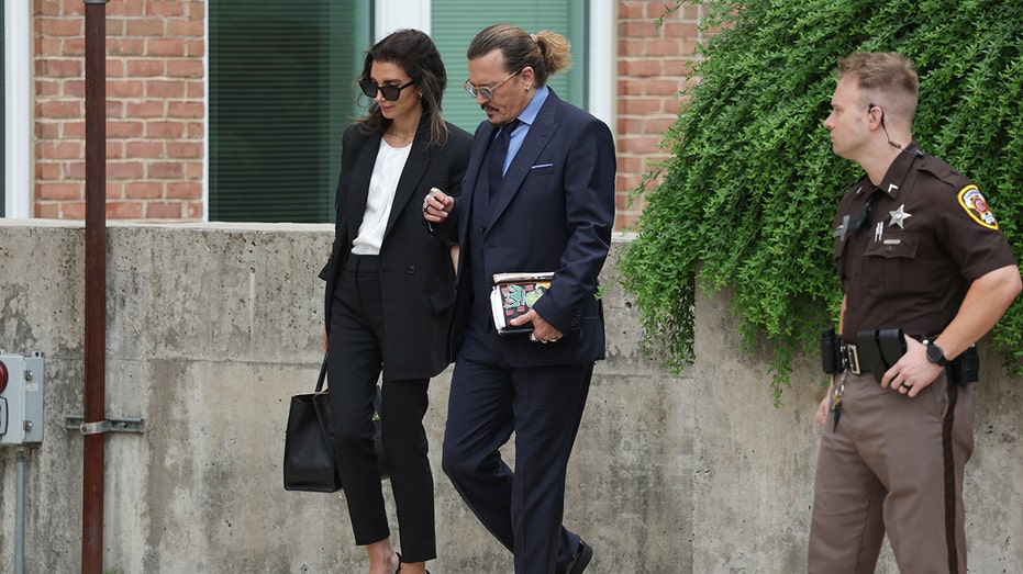 Johnny Depp with his lawyer during the defamation trial