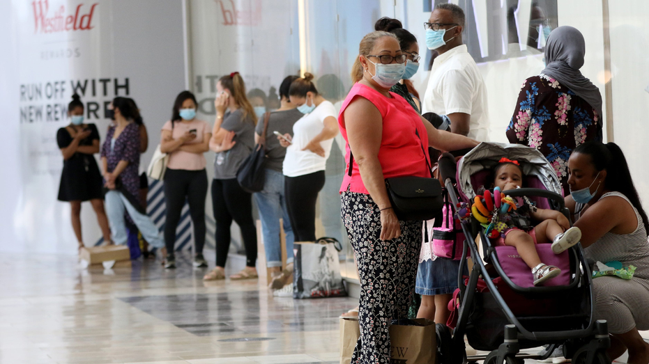 People standing in line mall