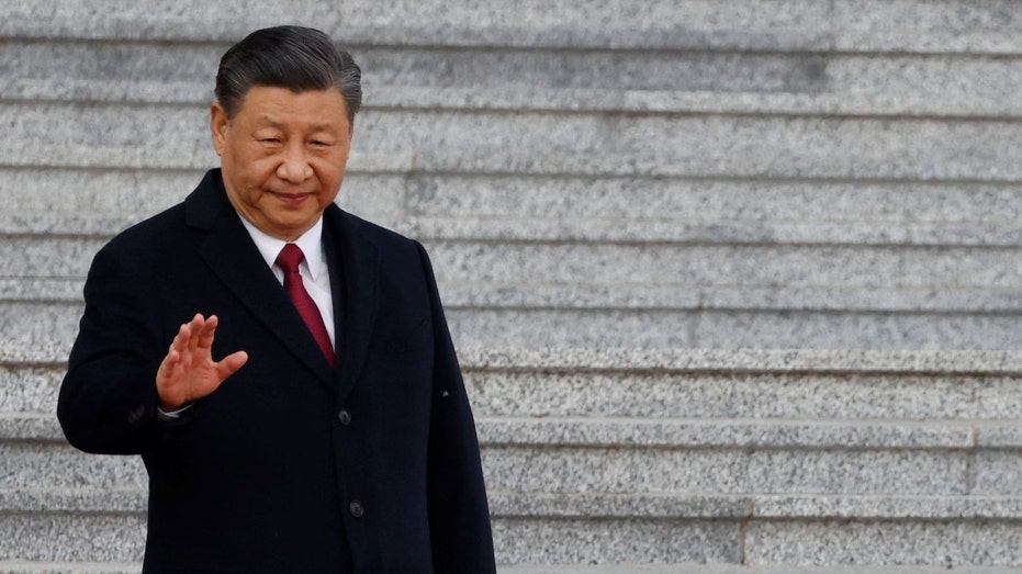 Chinese President Xi Jinping waving