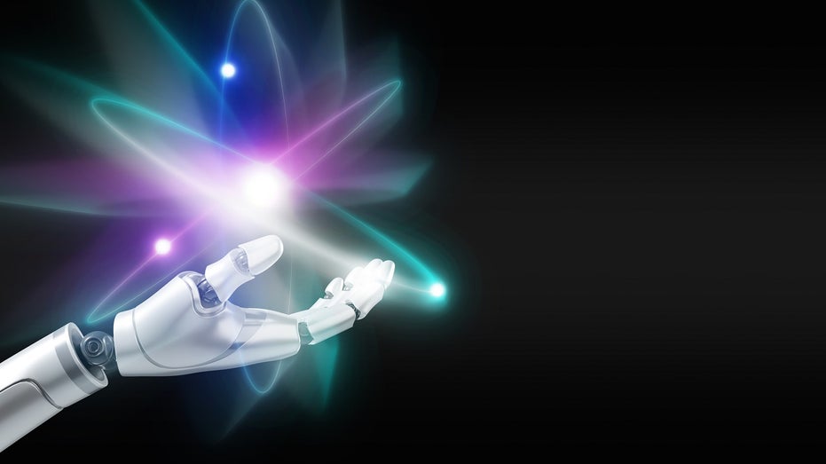 robot hand with atomic symbol