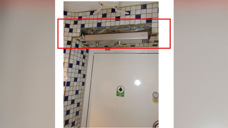 A photo showing the area the camera was hidden above the door