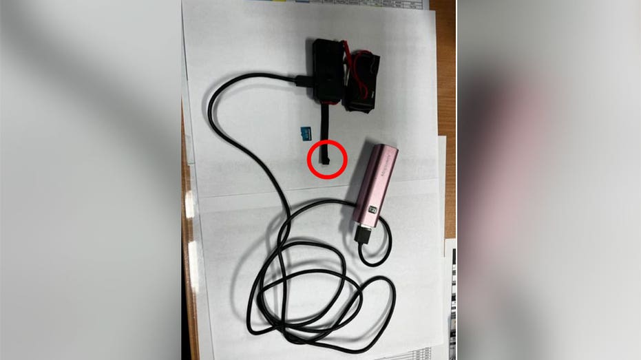 A Wi-Fi camera seized in the bathroom