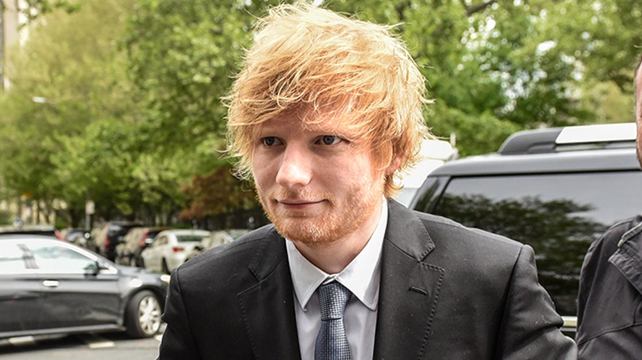 Ed Sheeran wears suit and tie while heading to New York court for copyright trial