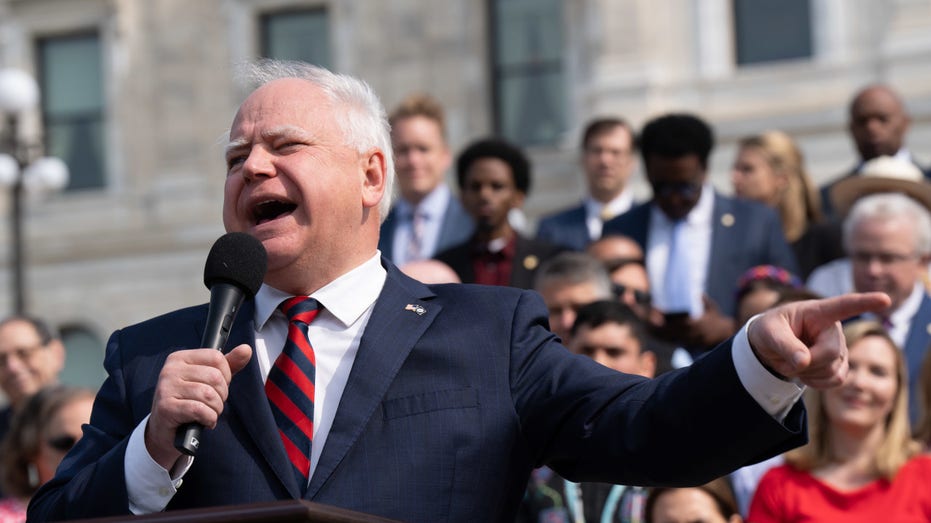 Minnesota gov. Tim Walz speaks outside the state capitol