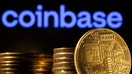 FILE PHOTO: A representation of the cryptocurrency is seen in front of Coinbase logo in this illustration taken, March 4, 2022. 