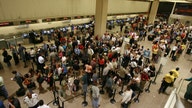 Thousands forced to wait hours at Houston airport after hundreds of delays, cancellations
