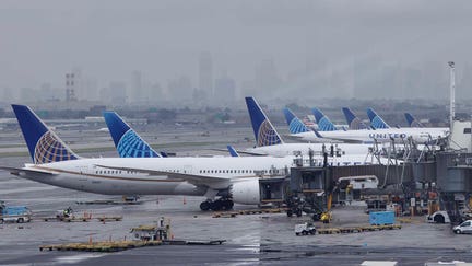 Planes are seen on the tarmac as people wait for their flight reschedule inside of the Newark International Airport on June 27, 2023, in Newark, New Jersey.