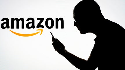 The Amazon shop logo is seen in this photo illustration on 31 May, 2023 in Warsaw, Poland. 