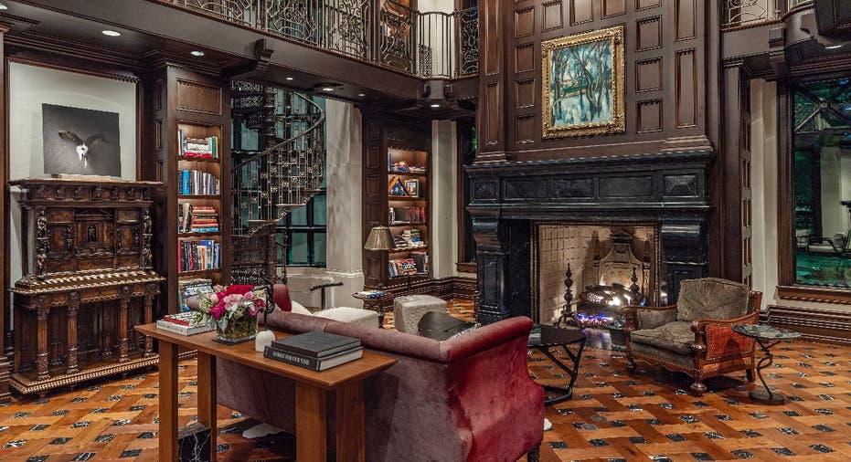 The Lodge in Hunters Creek's two-story library. 