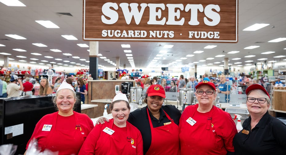 Employees at Buc-ee's selling sweets