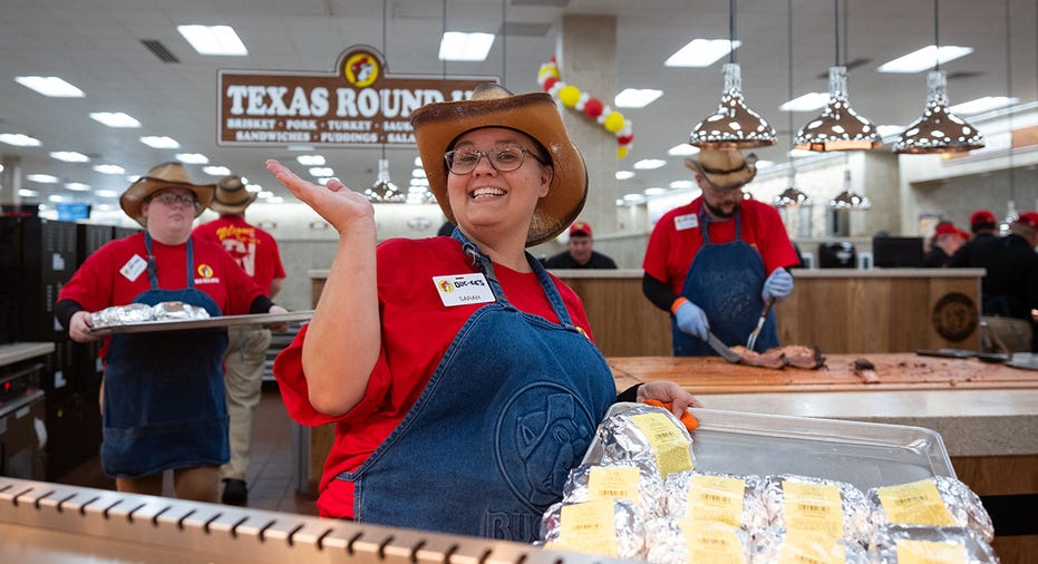 A woman wearing a cowboy had at Buc-ee's in Tennessee