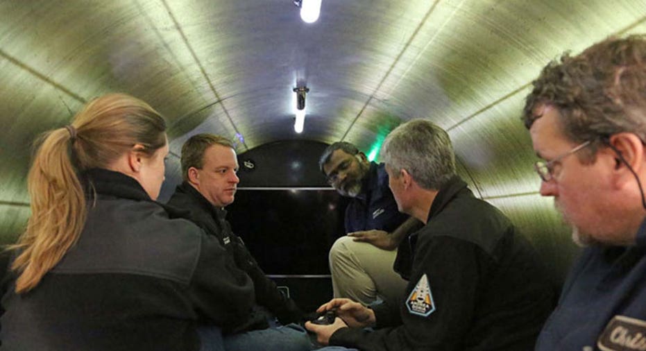 crew members inside the Titan submersible