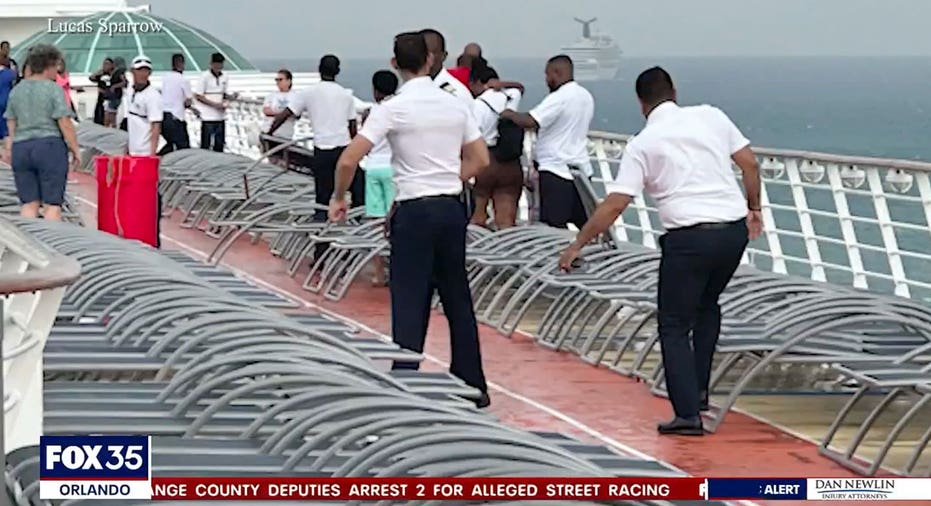 Cruise ship staff on deck