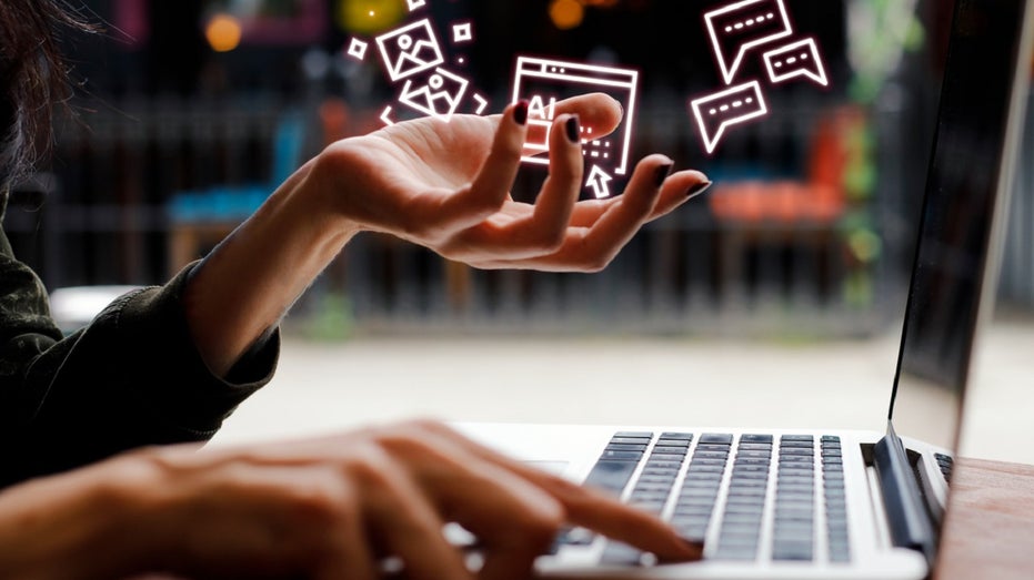 woman typing holding AI symbols