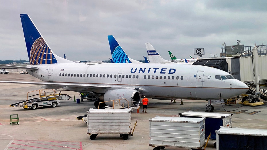 United Airlines plane at a terminal gate
