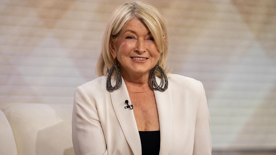 Martha Stewart smiles on the TODAY show with a white blazer and massive earrings