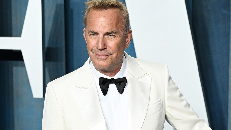 Kevin Costner wears white coat and black bow tie at Oscars after party