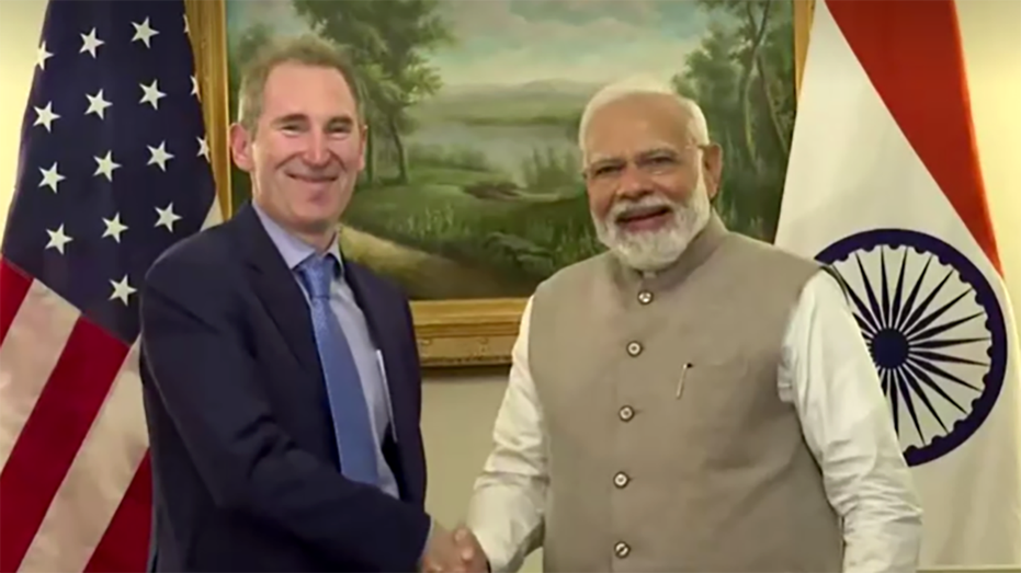 Indian PM Modi shaking hands with Amazon CEO Andrew Jassy.
