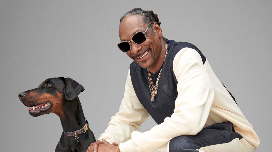 Snoop Dogg with his dog