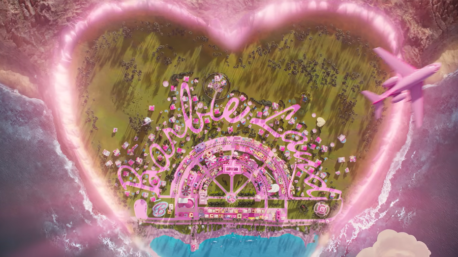 An aerial view of 'Barbie Land' with a pink heart drawn around it in pink writing with a pink plane flying away