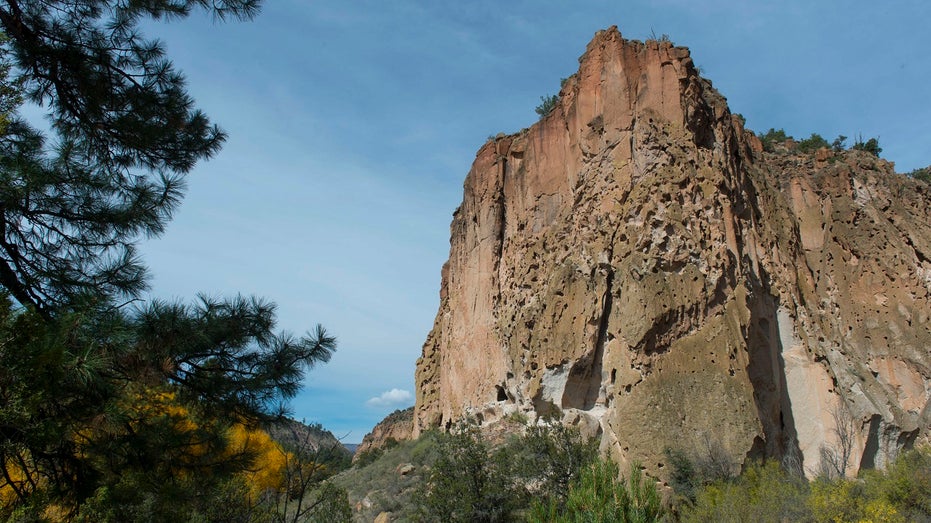 View of the cliff side with dwellings at the Bandelier