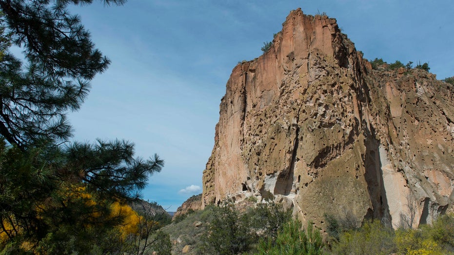 View of the cliff side with dwellings at the Bandelier